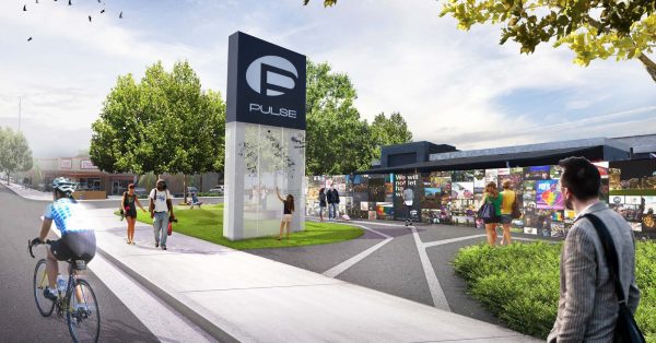 Designer's image of potential PULSE memorial building with visitors commemorating LGBTQ+ history.