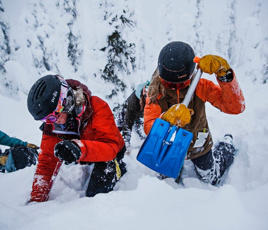 Image of students participating in an avalanche safety course.